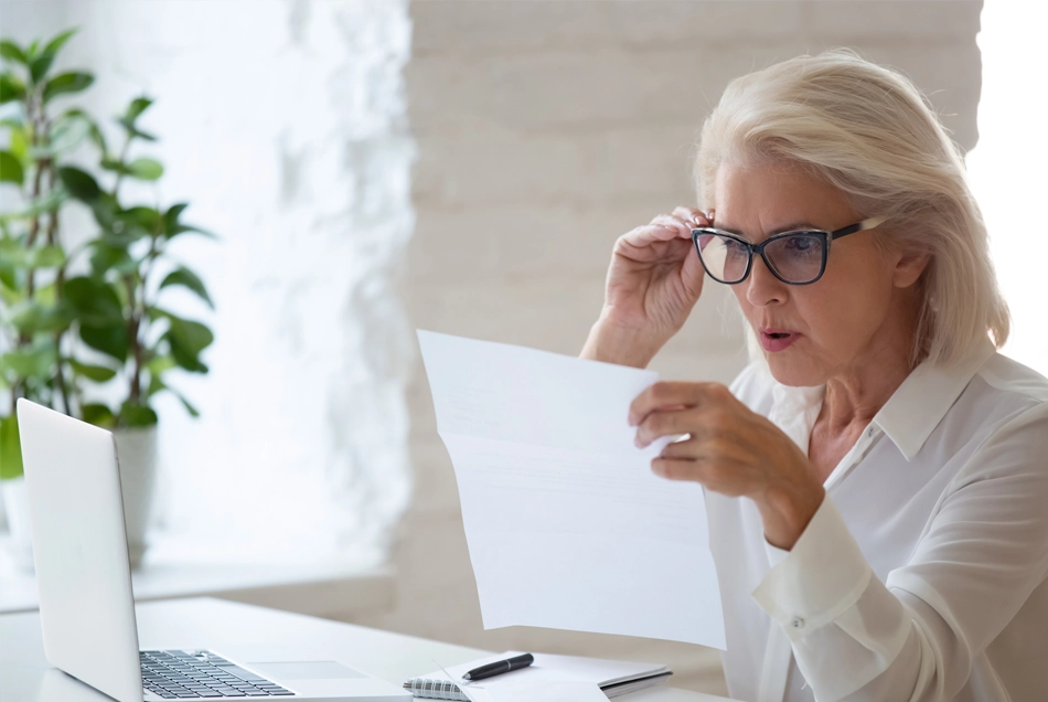 Woman reviewing medical bill